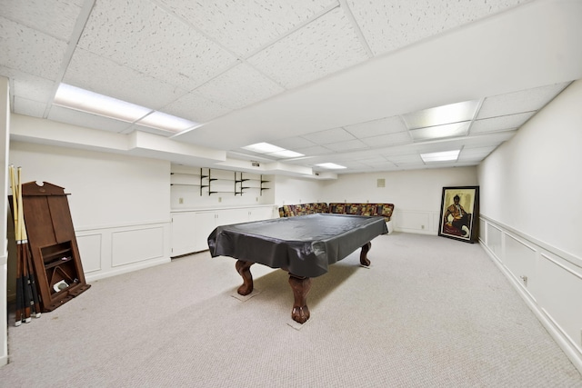 recreation room featuring a wainscoted wall, carpet, billiards, and a paneled ceiling