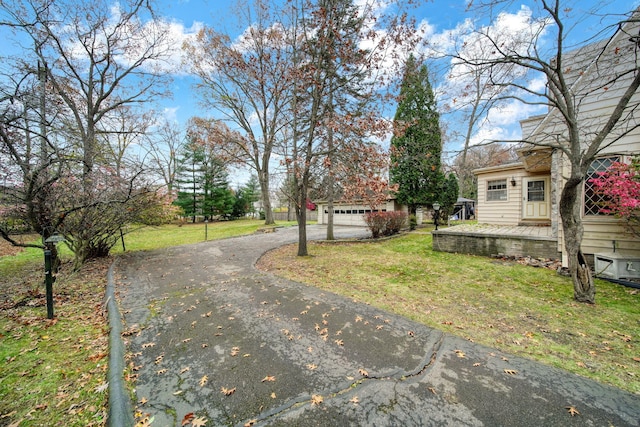 view of road featuring driveway