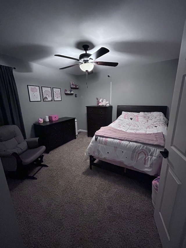 carpeted bedroom featuring a ceiling fan