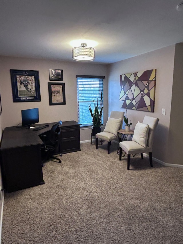 carpeted office space with baseboards