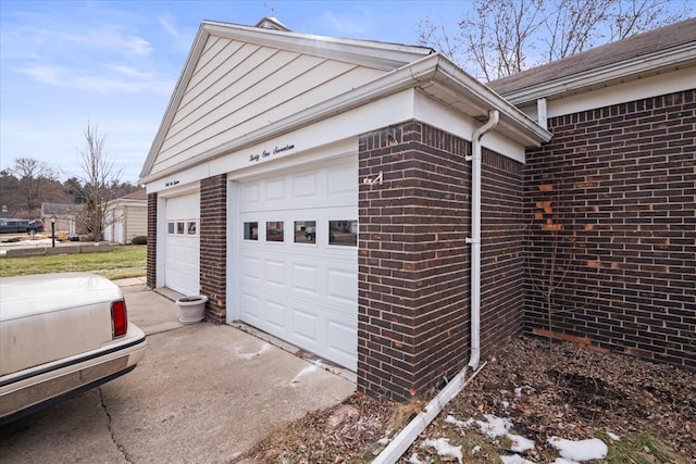 garage with driveway