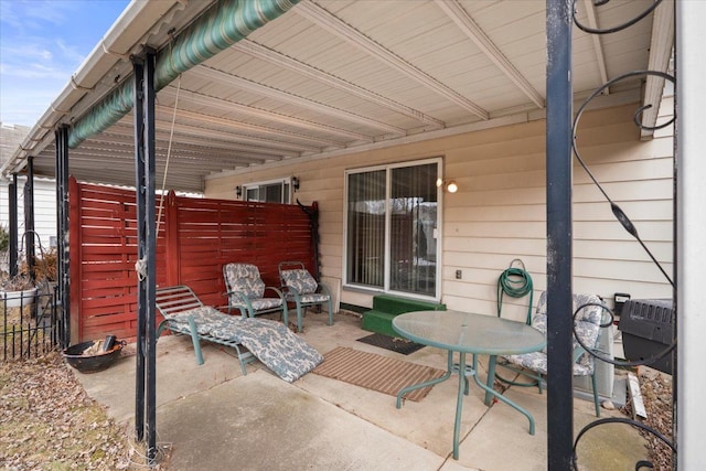 view of patio with fence