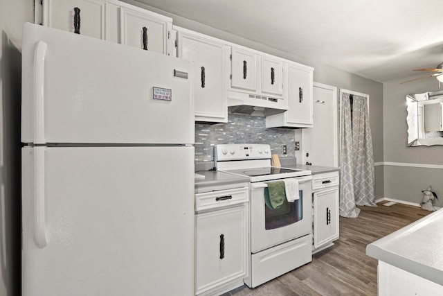 kitchen featuring light wood-style flooring, backsplash, white cabinetry, white appliances, and under cabinet range hood