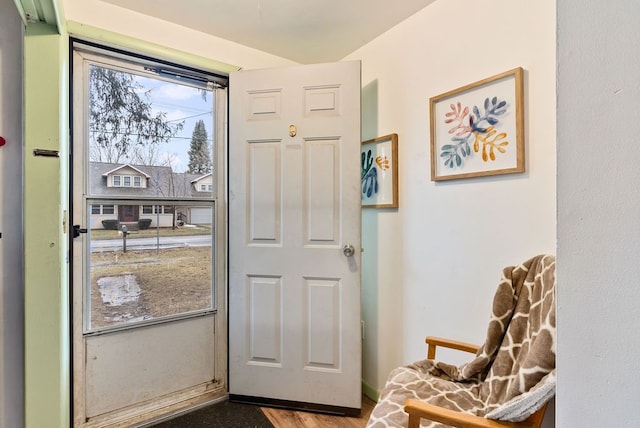 doorway featuring wood finished floors