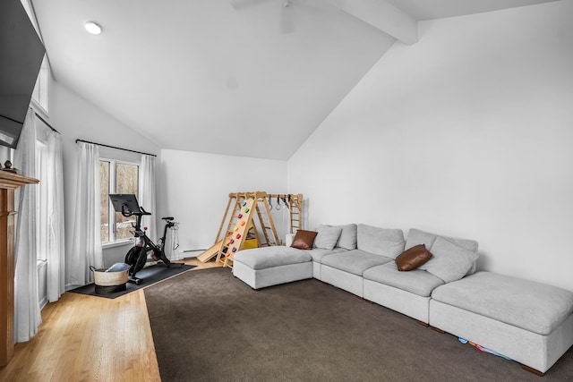 living area featuring vaulted ceiling with beams, ceiling fan, and a baseboard radiator