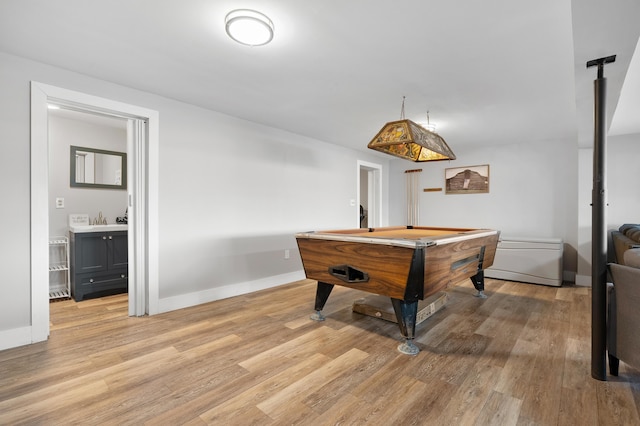 recreation room featuring light wood-style floors, pool table, and baseboards