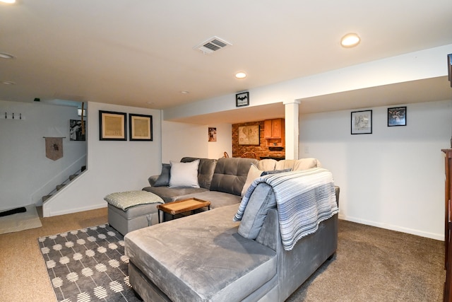 living area featuring dark colored carpet, visible vents, baseboards, and recessed lighting