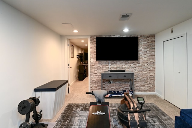 carpeted living room with recessed lighting and baseboards