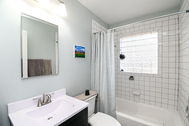 bathroom with toilet, shower / tub combo with curtain, and vanity