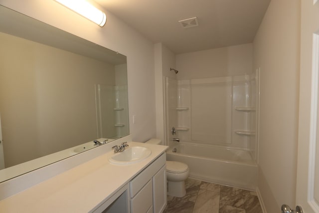 full bath with visible vents,  shower combination, vanity, and toilet