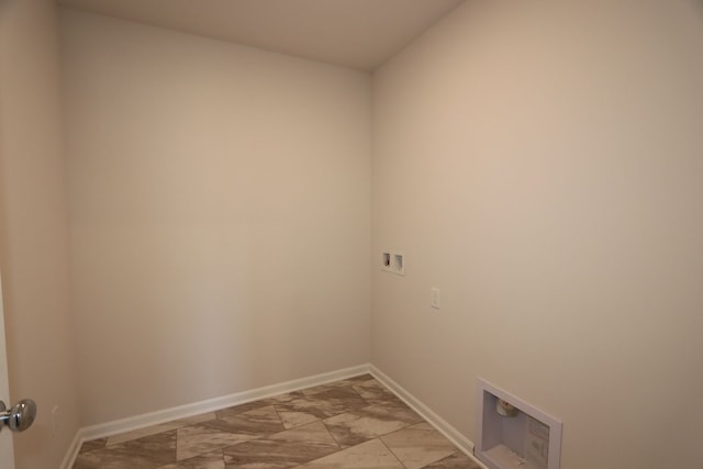 laundry room with marble finish floor, laundry area, washer hookup, and baseboards