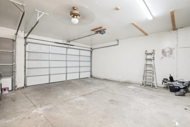 garage featuring a garage door opener