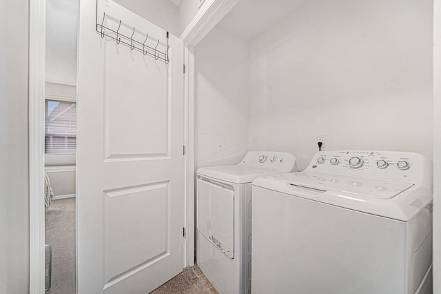 laundry area with carpet and independent washer and dryer