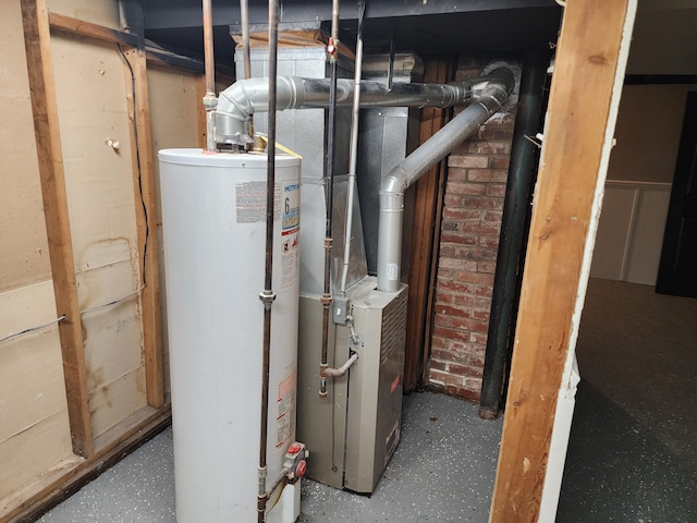 utility room featuring water heater