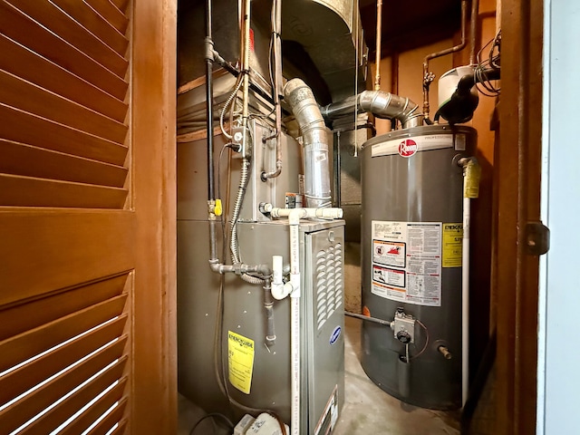 utility room with gas water heater