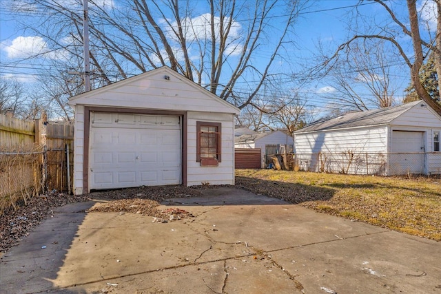 detached garage with fence