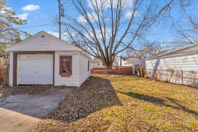 detached garage with fence