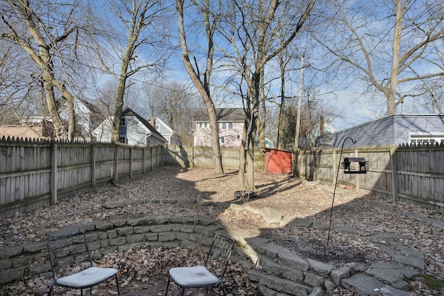 view of yard featuring a fenced backyard