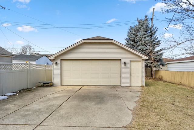 detached garage with fence