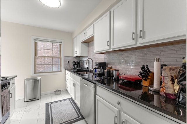 kitchen featuring a sink, baseboards, marble finish floor, stainless steel dishwasher, and decorative backsplash