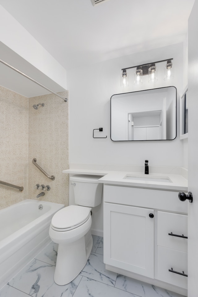 full bath with marble finish floor, bathing tub / shower combination, vanity, and toilet