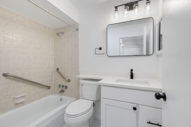 bathroom featuring toilet, vanity, and shower / bathtub combination