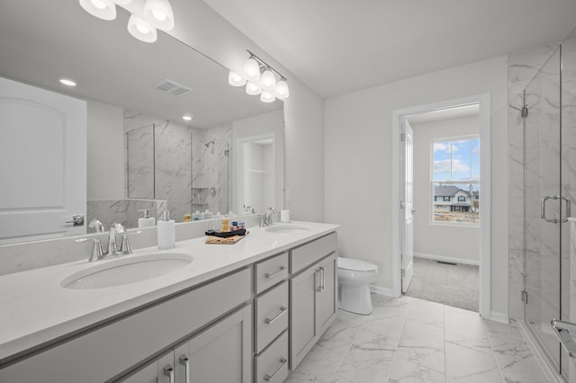 full bathroom featuring visible vents, marble finish floor, a marble finish shower, and a sink