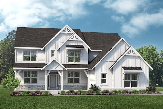 view of front of property with stone siding, a shingled roof, board and batten siding, and a front yard