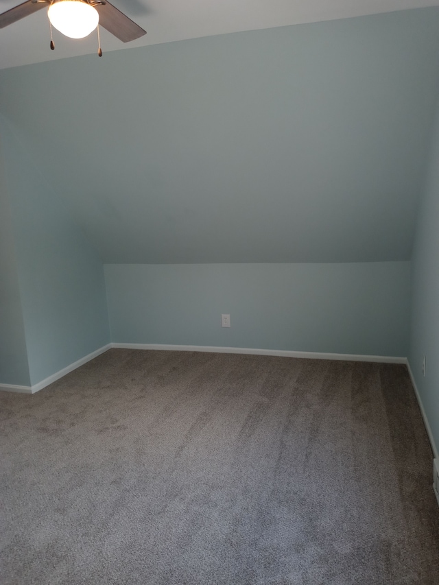 bonus room featuring vaulted ceiling, ceiling fan, and carpet flooring