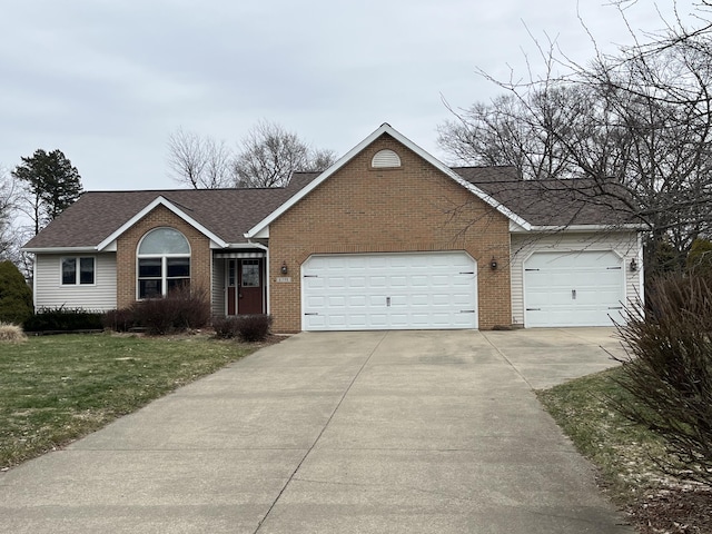 ranch-style house with a garage, brick siding, driveway, roof with shingles, and a front lawn