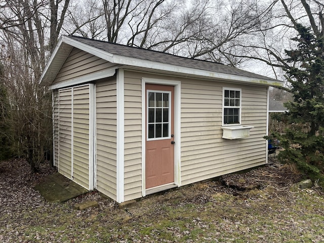 view of outbuilding with an outdoor structure