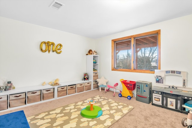 playroom featuring visible vents and carpet flooring