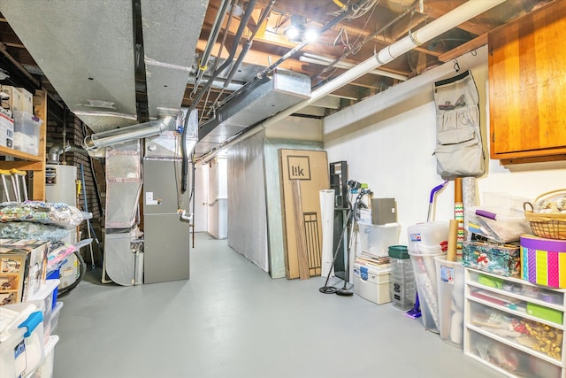 unfinished basement with heating unit