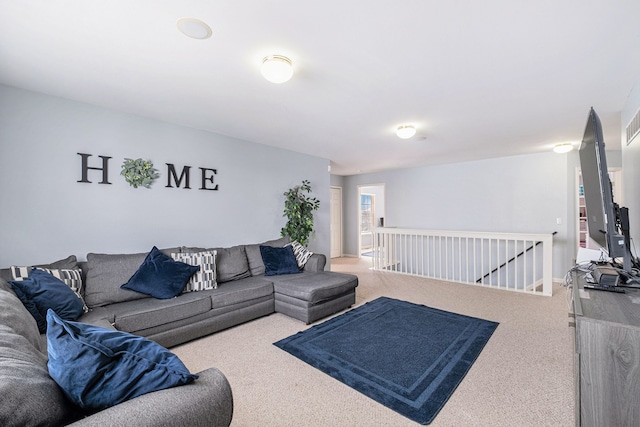 living area with carpet flooring