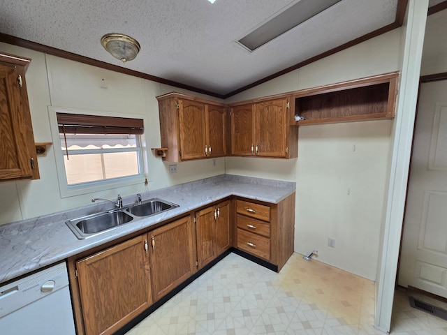 kitchen with light floors, lofted ceiling, brown cabinetry, a sink, and white dishwasher