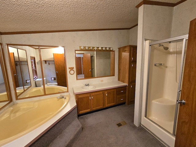 full bathroom with a textured ceiling, vanity, a bath, a stall shower, and crown molding