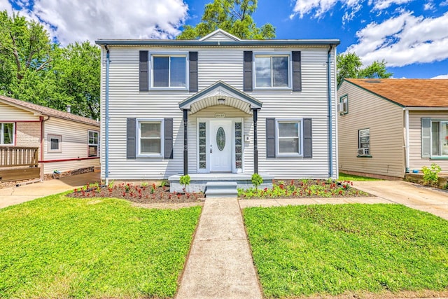 view of front of home featuring a front yard