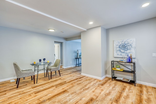 sitting room featuring recessed lighting, wood finished floors, and baseboards