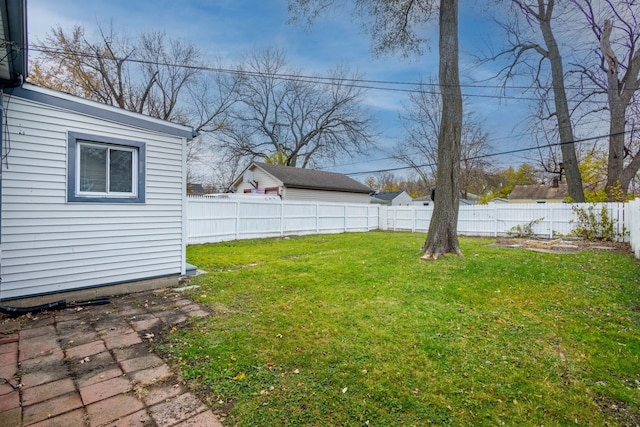 view of yard with a fenced backyard