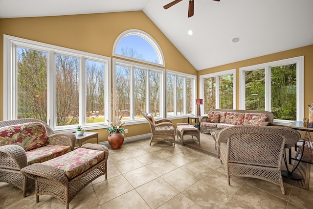 sunroom featuring a ceiling fan and vaulted ceiling