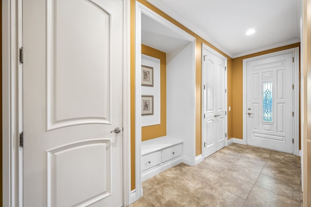 foyer entrance featuring light tile patterned floors, ornamental molding, recessed lighting, and baseboards