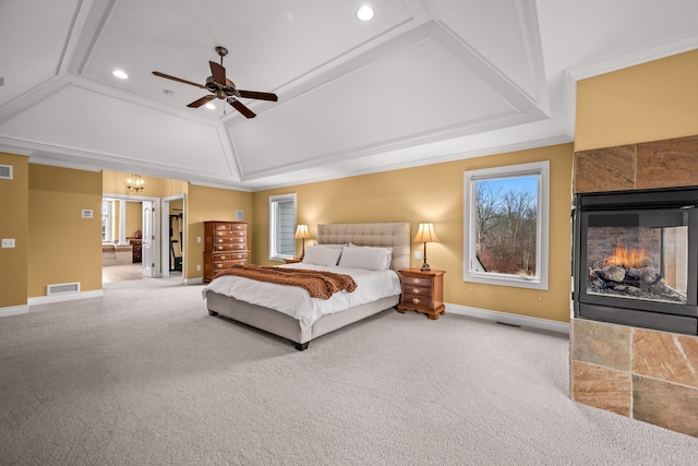 bedroom featuring recessed lighting, visible vents, a tiled fireplace, carpet flooring, and baseboards