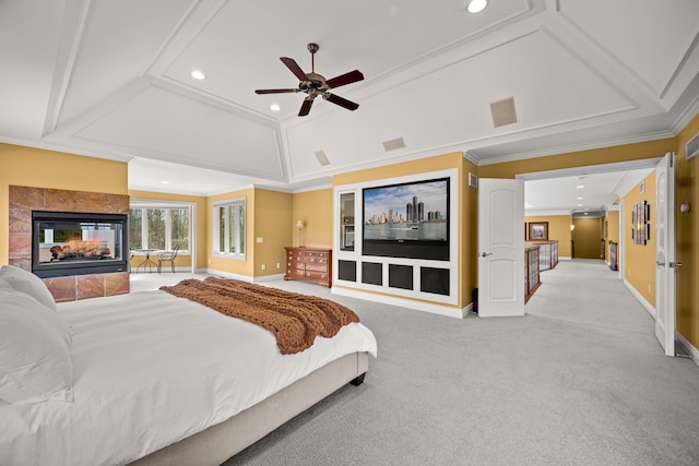 bedroom featuring recessed lighting, light colored carpet, a fireplace, baseboards, and crown molding