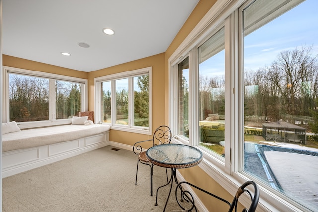 sunroom / solarium with visible vents