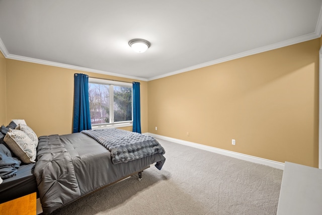 carpeted bedroom featuring ornamental molding and baseboards