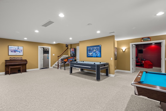 rec room with visible vents, baseboards, light colored carpet, and recessed lighting