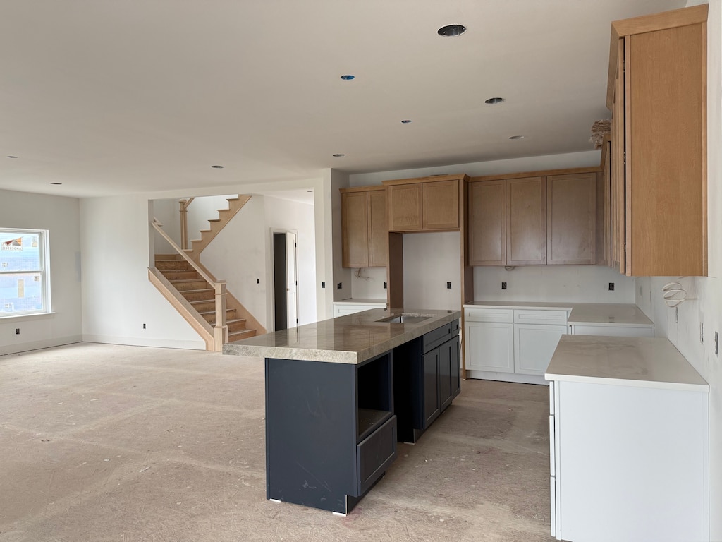 kitchen featuring a center island and recessed lighting