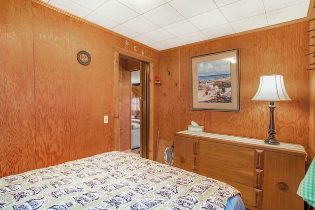 bedroom with crown molding