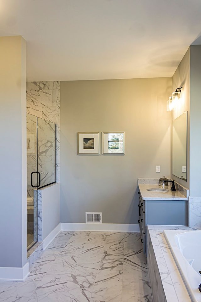 bathroom with marble finish floor, baseboards, visible vents, and vanity