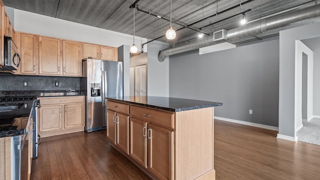 kitchen featuring dark wood-style floors, a center island, stainless steel appliances, backsplash, and baseboards